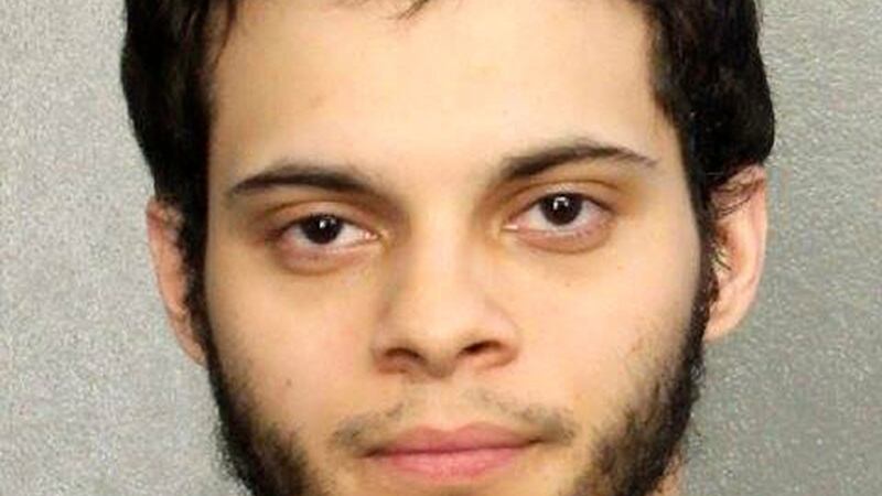 An undated handout photo made available by the Broward County Sheriff’s Department on Saturday shows Esteban Santiago in custody following a shooting which left at least five people dead and several injured at the Fort Lauderdale-Hollywood International Airport in Floriday. Photograph: EPA/Broward County Sheriff’s Department