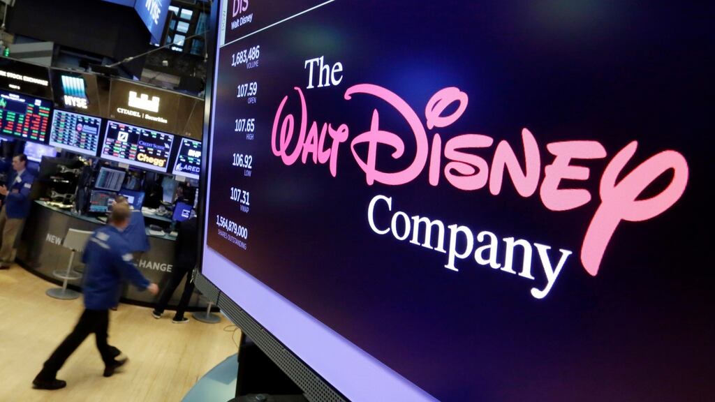 The Walt Disney Co logo on a screen above the floor of the New York Stock Exchange. Total revenue rose 7 per cent to $15.23 billion, but missed analysts’ expectation of $15.34 billion. Photograph: Richard Drew/AP