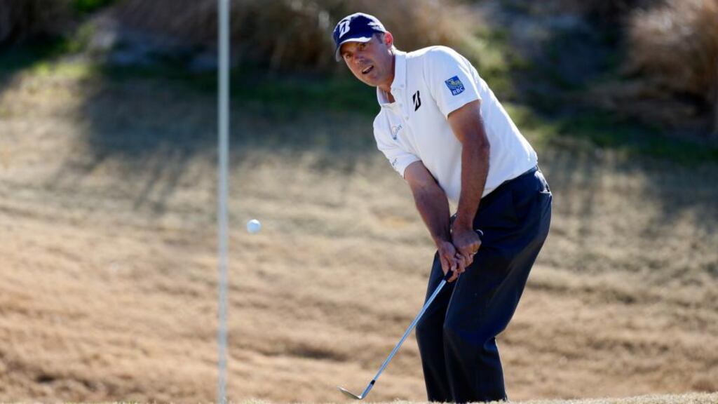 Matt Kuchar takes his shot out of the rough on the seventh hole during round two of the Humana Challenge on the at PGA West in La Quinta, California. Photograph: Todd Warshaw/Getty Images