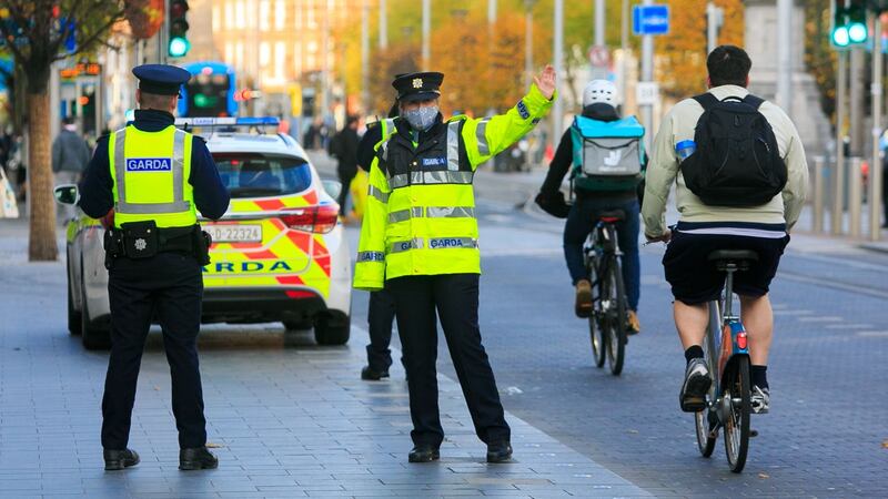 Gardaí operating a Covid-19 restrictions checkpoint on O’Connell Street, Dublin, this weekend. Photograph: Gareth Chaney/Collins