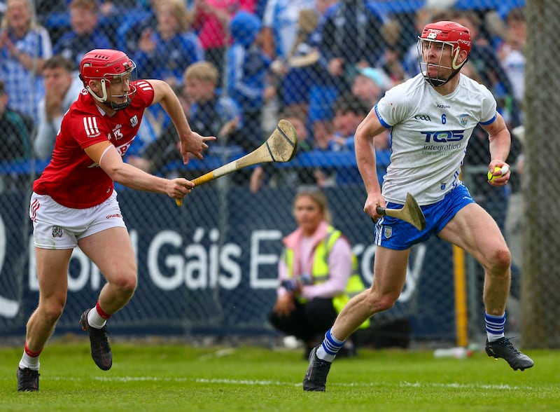 Cork's Alan Connolly tires to contain Waterford's Tadhg De Búrca in May 2022. Photograph: Ken Sutton/Inpho