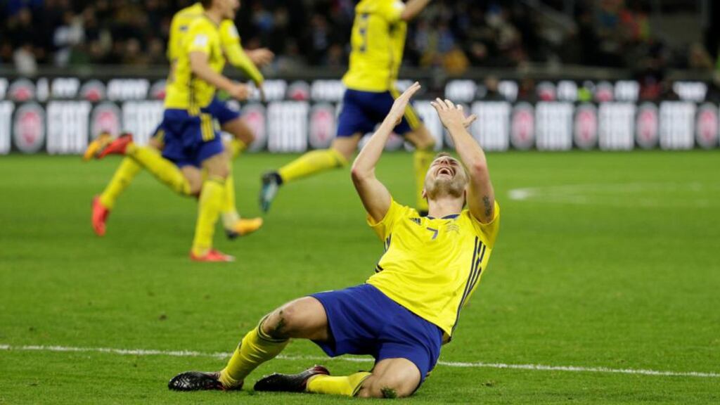 Sebastian Larsson reacts after Sweden draw 0-0 with Italy to secure their place at next summer’s World Cup. Photograph: Reuters/Max Rossi