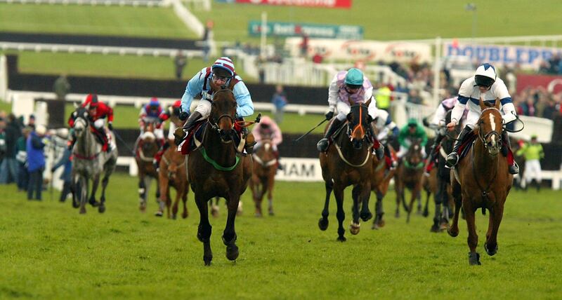Jimmy Culloty on Best Mate (left) gets up to beat Commanche Court (right) and See More Business (centre) in the 2002 Cheltenham Gold Cup. It proved the first of three successive victories in the famed 'Blue Riband'. Photograph: Mike Hewitt/Getty Images