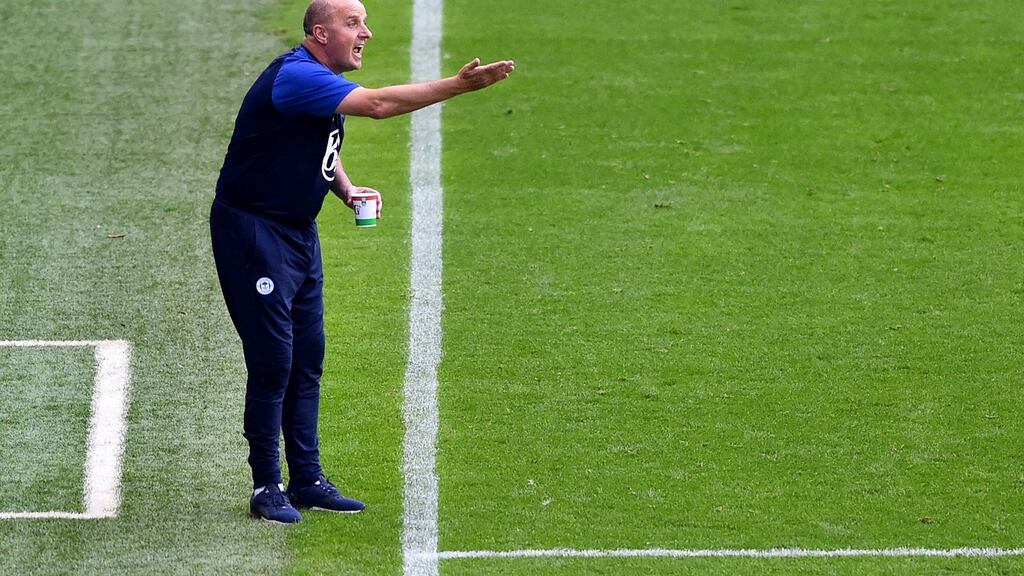 Paul Cook:  the Wigan Athletic  manager is facing an anxious wait as his club have appealed a 12-point deduction for entering administration. Photograph:  Nathan Stirk/Getty Images