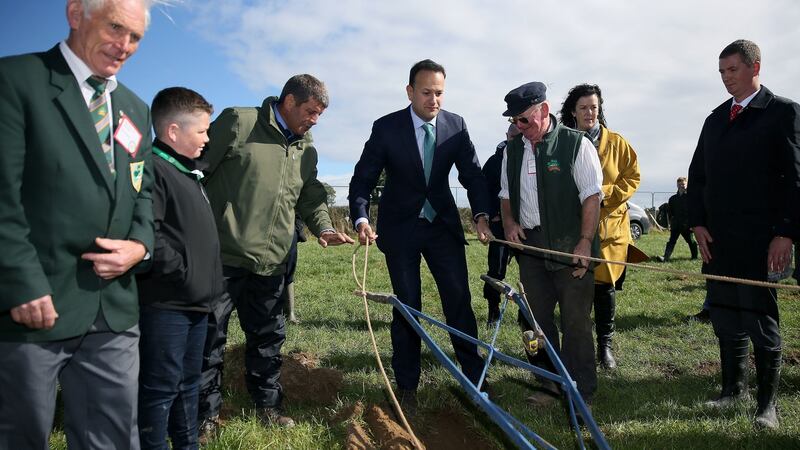 Taoiseach Leo Varadkar takes the reins as he tries his hand at ploughing during a visit to the Irish 2018 National Ploughing Championship in Tullamore. Photograph: PA