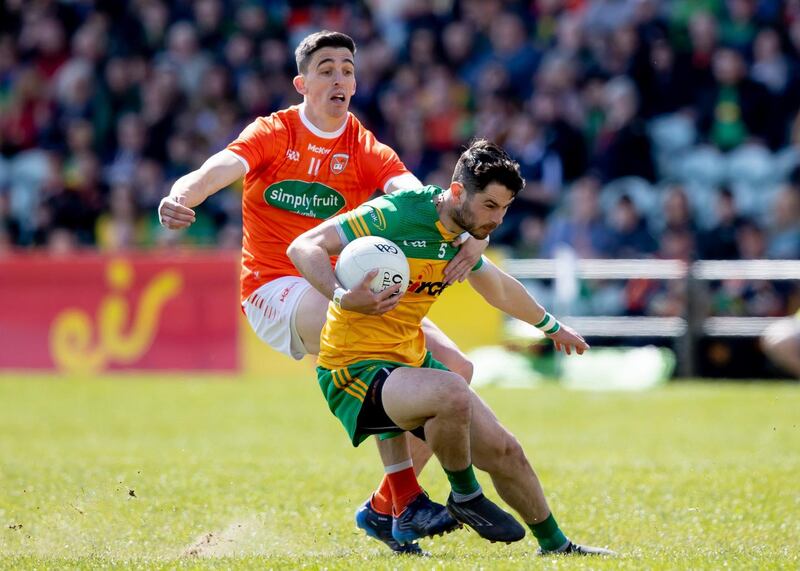 Ryan McHugh of Donegal with Rory Grugan of Armagh. Photograph: Morgan Treacy/Inpho