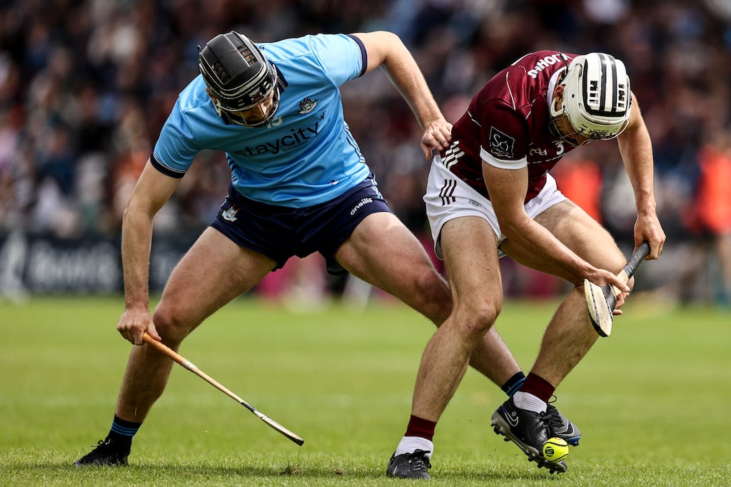 Dublin's Ronan Hayes with Daithi Burke of Galway. Photograph: Ben Brady/Inpho
