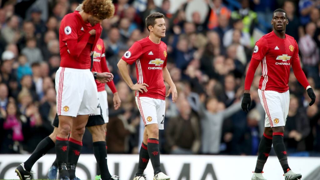 Manchester United’s Marouane Fellaini, Ander Herrera and Paul Pogba dejected after Chelsea score their second goal during the Premier League match at Stamford Bridge, London. Photo: Nick Potts/PA Wire