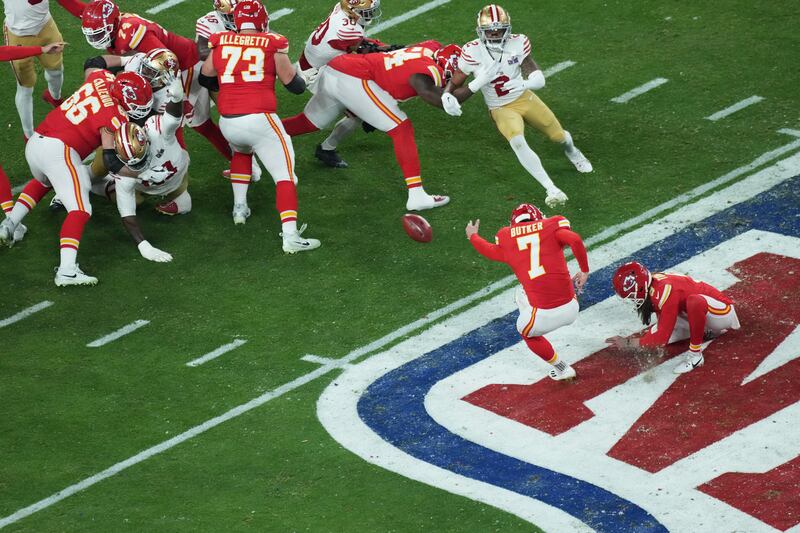 Harrison Butker scores a 57-yard field goal during the third quarter/ Photograph: Doug Mills/The New York Times
