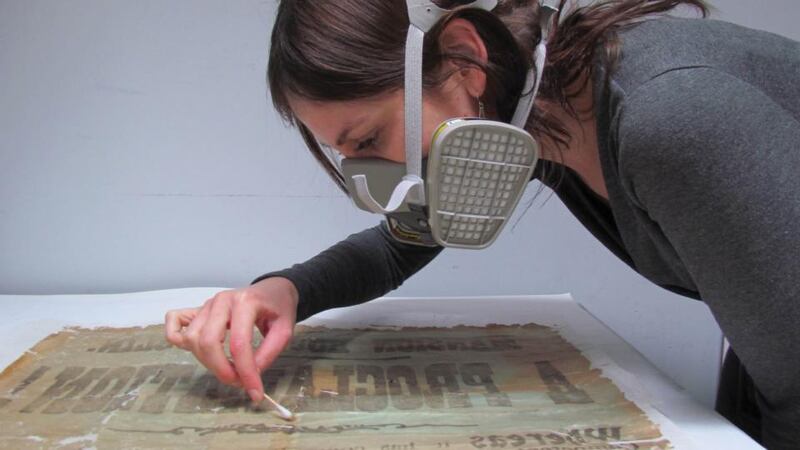 Enriching awareness of our heritage: restoring a political poster. Photograph courtesy of the Heritage Council