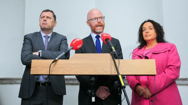 Fianna Fáil spokesperson on Public Expenditure, Barry Cowen (left), health spokesperson Stephen Donnelly (centre) and disability spokesperson, Margaret Murphy  speaking to media on Tuesday. Photograph:  Collins