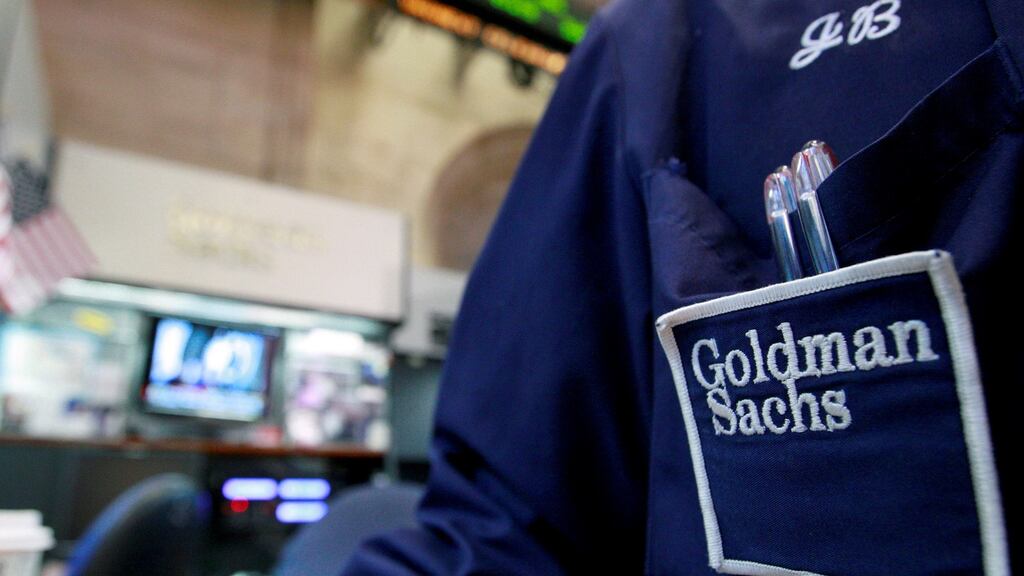 A trader works at the Goldman Sachs stall on the floor of the New York Stock Exchange. Goldman Sachs and Morgan Stanley both topped analyst expectations in third quarter results on Tuesday. Photograph: Brendan McDermid/Reuters