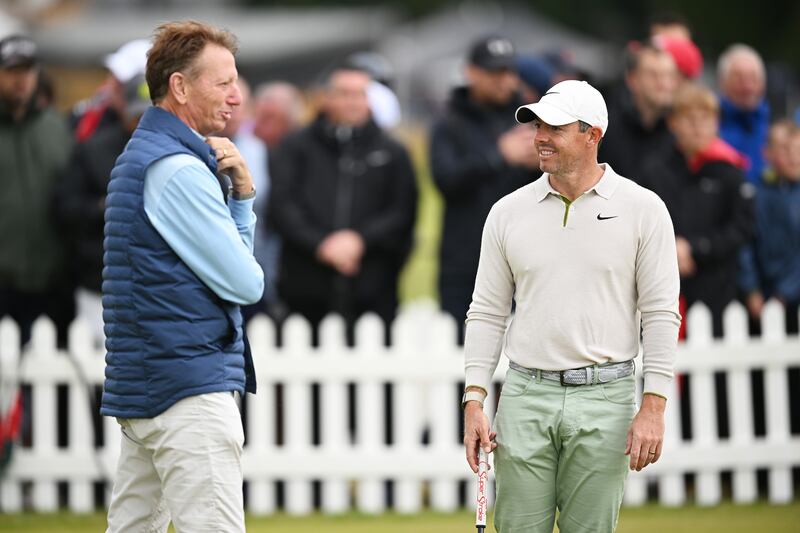 Rory McIlroy talking with putting coach, Brad Faxon. Photograph: Octavio Passos/Getty