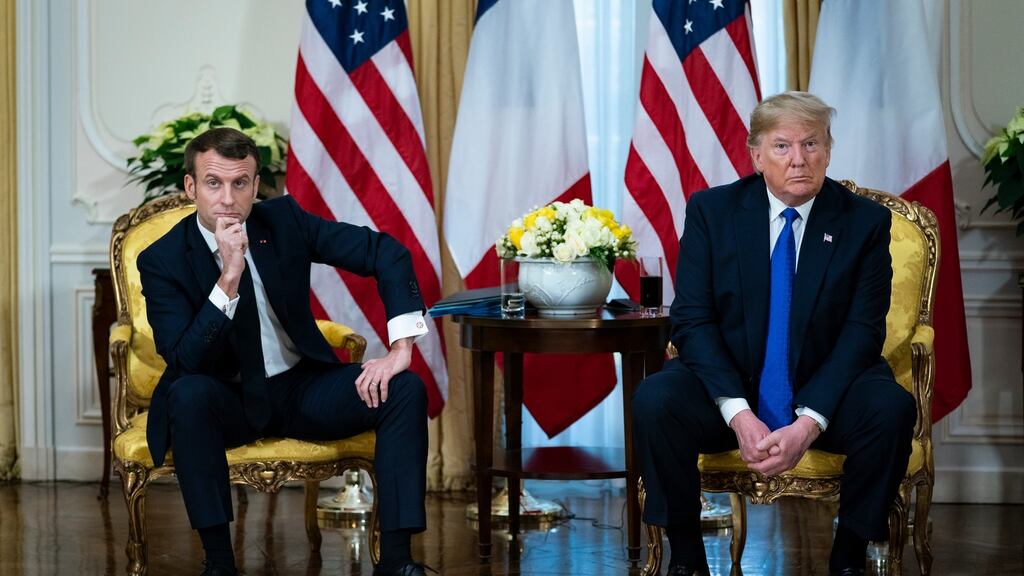 President Donald Trump meets with French president Emmanuel Macron at Winfield House in London on Tuesday. Photograph: Al Drago/The New York Times