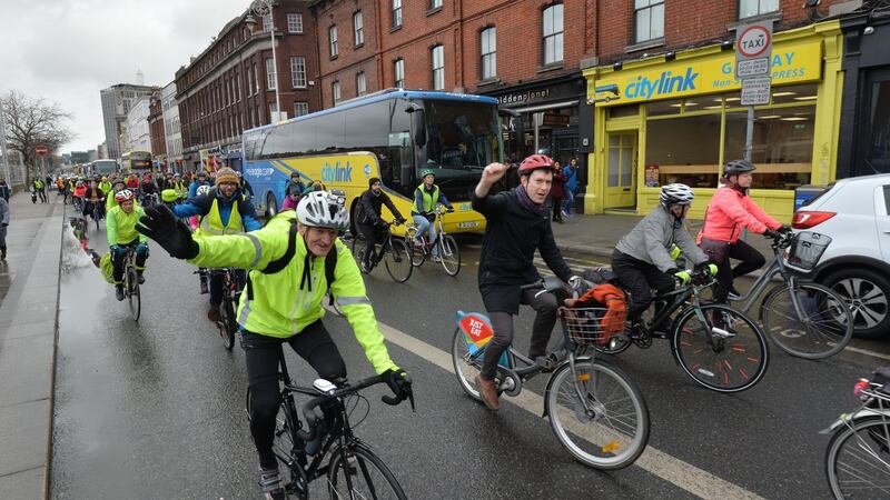 Dublin Cycling Campaign protesters move down Wellington Quay on Sunday morning. Photograph: Alan Betson