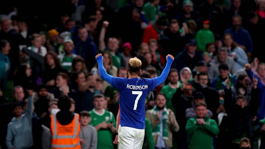 Ireland’s Callum Robinson celebrates with the home support during the 4-0 win over Qatar at the Aviva Stadium. Photograph: Ryan Byrne/Inpho