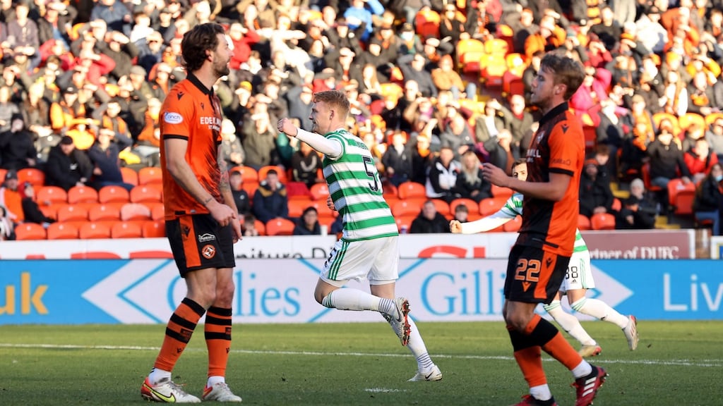Liam Scales celebrates scoring Celtic’s third goal during the Premiership match against Dundee United at Tannadice Park. Photograph: Steve Welsh/PA Wire