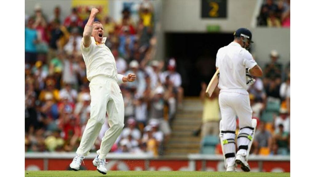 Australia's Peter Siddle celebrates after claiming the wicket of Kevin Pietersen during day one of the first Ashes Test at The Gabba in Brisbane, Australia. (Photograph: Ryan Pierse/Getty Images)