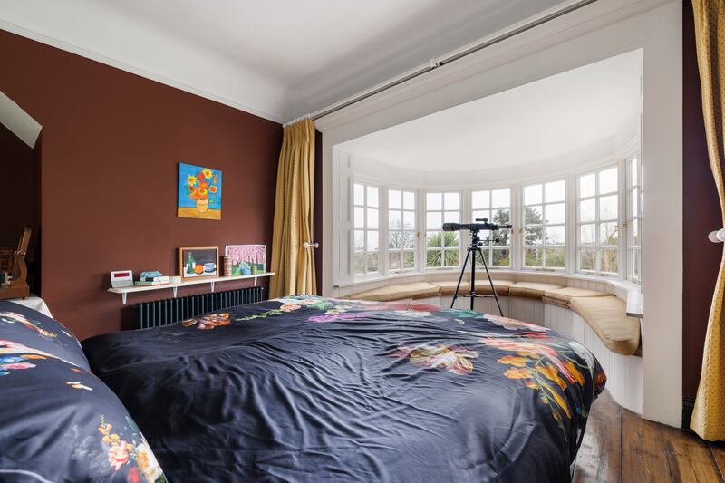 The principal bedroom has a bay window