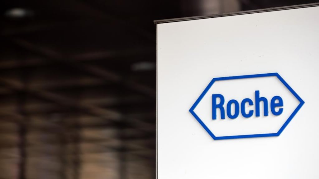 A Roche logo sits on a sign outside Roche Holding’s headquarters in Basel, Switzerland. Photograph: Philipp Schmidli/Bloomberg