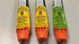 Mylan slashes earnings forecast on US generics price cuts