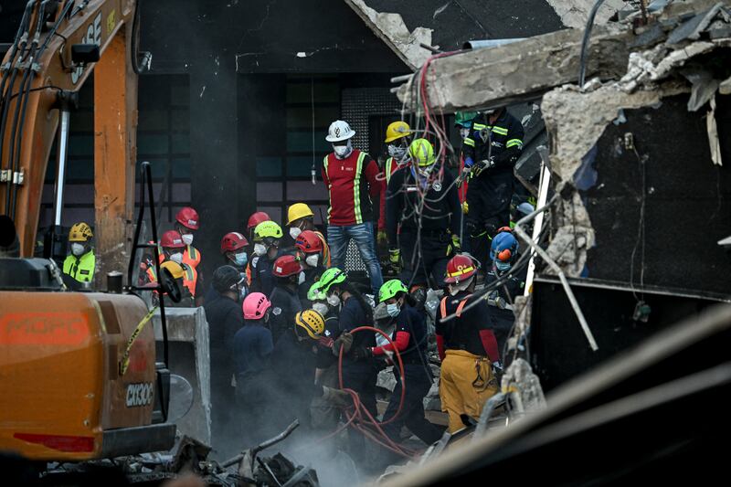 Rescue teams work at the Jet Set nightclub following the collapse of its roof in Santo Domingo. Photograph: MARTIN BERNETTI/AFP via Getty Images