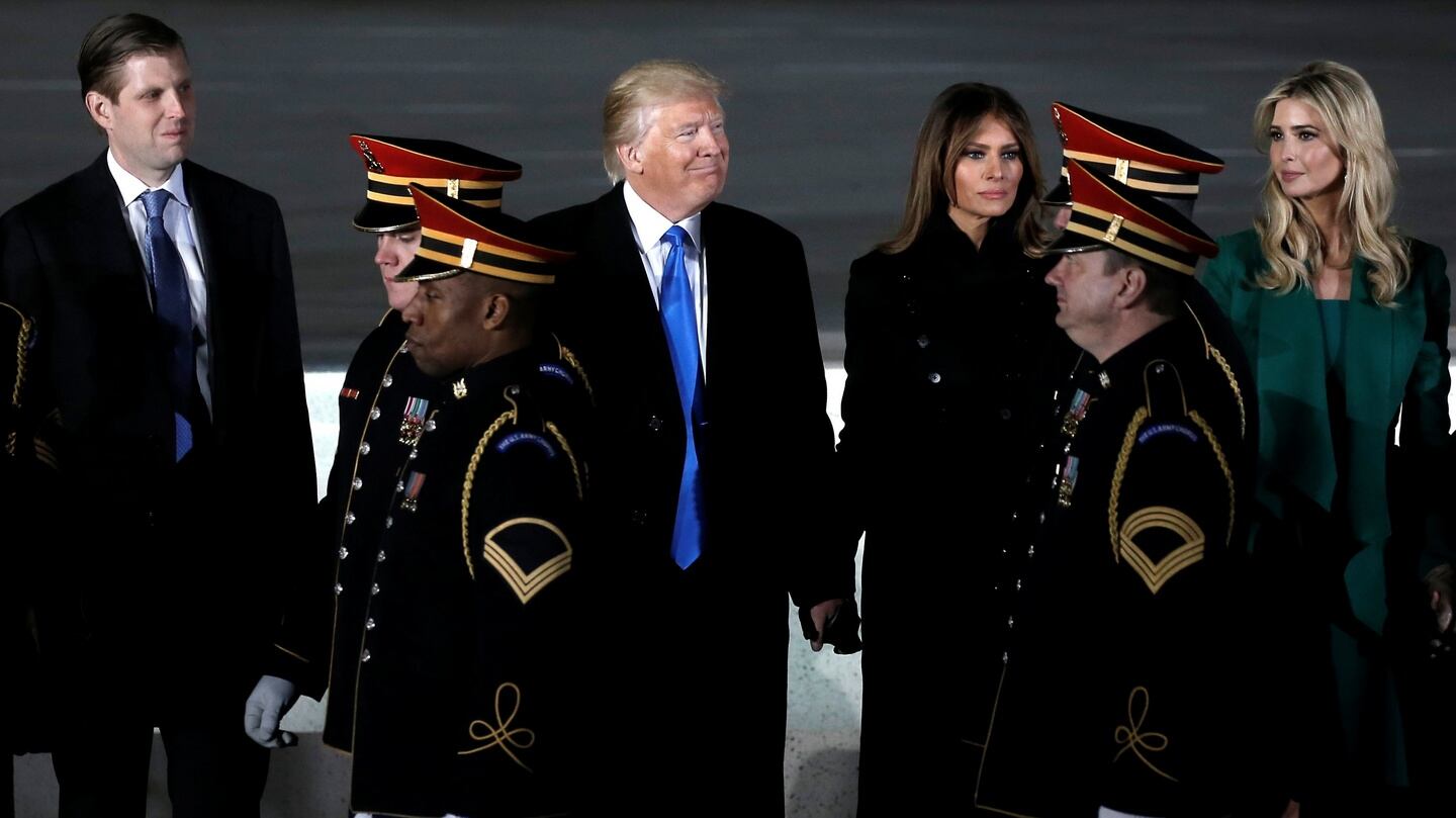 Donald Trump stands with his wife Melania, daughter Ivanka (2nd R) and son Eric (2nd L), as members of the US Army Band pass by at the ‘Make America Great Again! Welcome Celebration’ at the Lincoln Memorial. Photograph: Mike Segar/Reuters