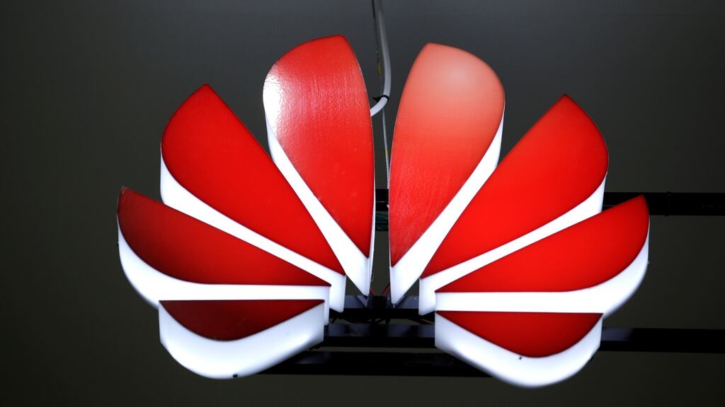A Huawei logo at an exhibition during the World Intelligence Congress in Tianjin, China, on Thursday. Photograph: Jason Lee/Reuters