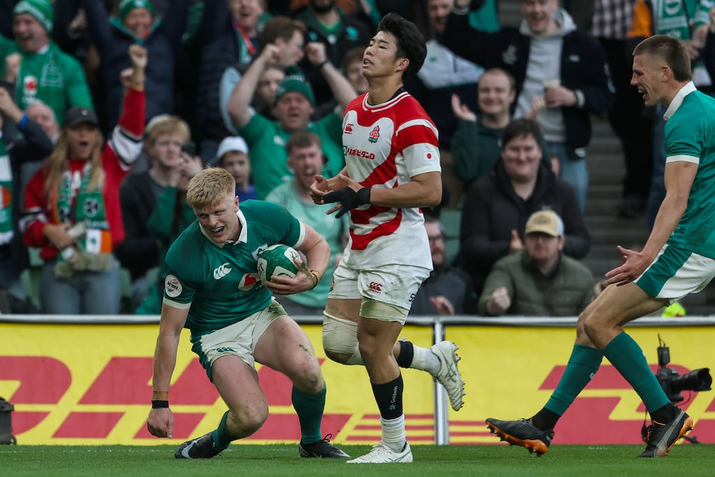 Ireland's Tommy O'Brien celebrates scoring his side's sixth try of the match. Photograph: Gary Carr/Inpho
