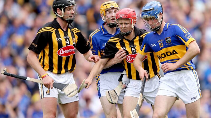 Jackie Tyrrell with Lar Corbett, Tommy Walsh and Pa Bourke during the 2012 All-Ireland hurling final. Photograph: James Crombie/Inpho