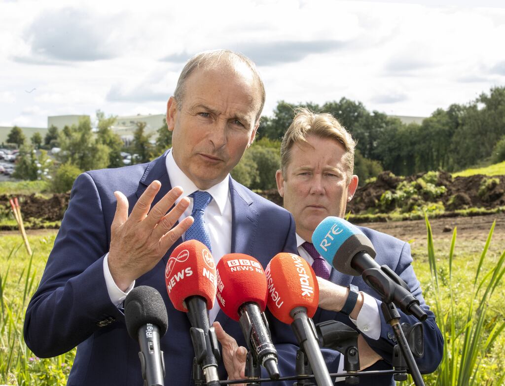 Taoiseach Micheál Martin speaking to reporters with Minister for Housing Darragh O'Brien in Clones, Co Monaghan on Tuesday. Photograph: Liam McBurney/PA Wire