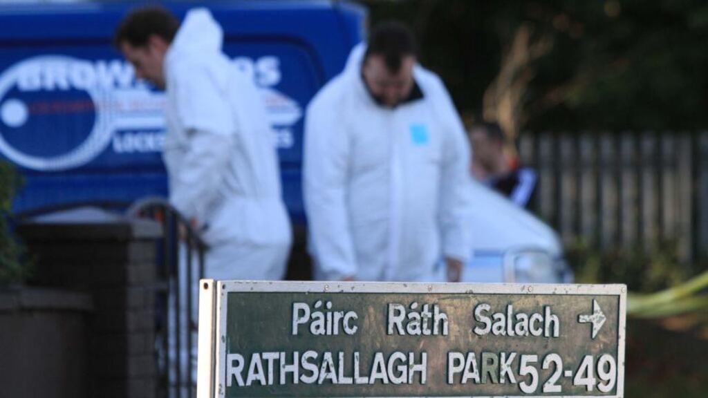 Members of the Garda Technical Bureau examine the scene of a fatal stabbing in Shankill, Co Dublin this afternoon. Photograph: Nick Bradshaw
