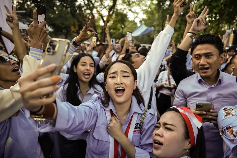 Supporters gather outside the home of presidential candidate Prabowo Subianto on Wednesday after polls closed in Indonesia's presidential and legislative elections. Photograph: Yasuyoshi Chiba/AFP via Getty Images