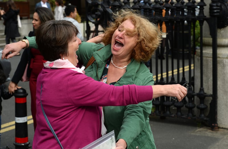 Ingrid Glen, (right, England) from Cork embraces her sponsor Millie Kingston outisde the National Concert Hall, Dublin. Photograph: Dara Mac Dónaill/The Irish Times