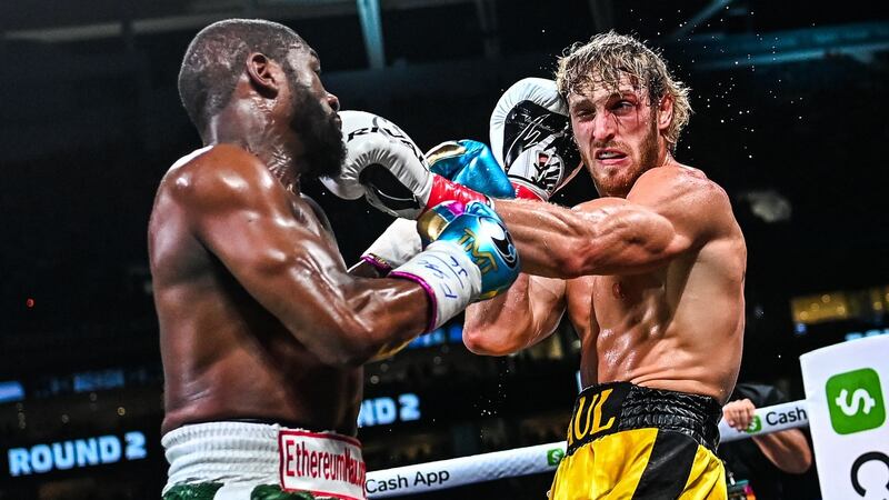 Floyd Mayweather and Logan Paul trade blows during their eight-round exhibition bout at Hard Rock Stadium in Miami, Florida on Sunday night. Photograph: Chandan Khanna/AFP via Getty Images