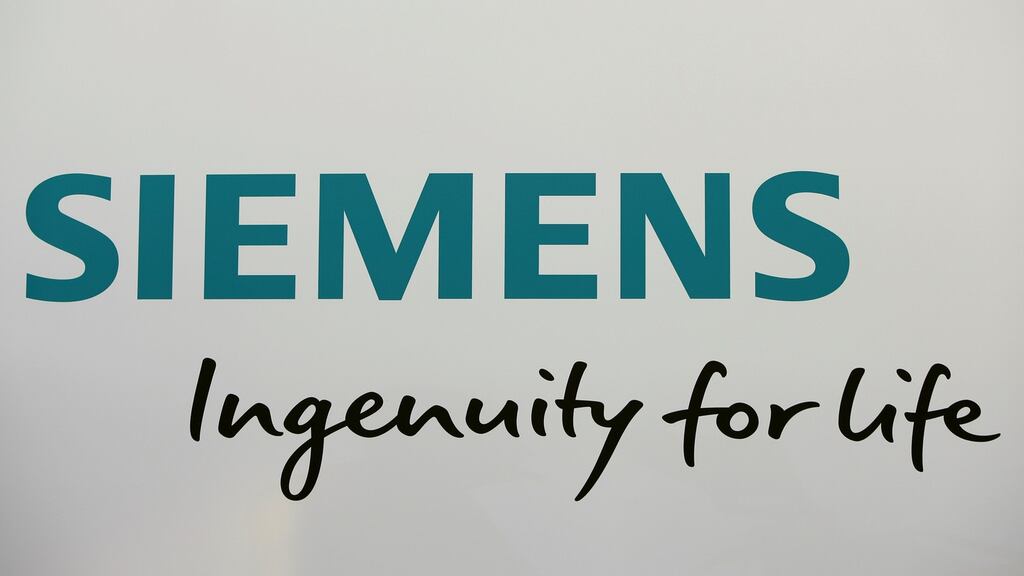 Siemens raised its forecast for earnings per share for the full year to between €6.50 and €6.70 compared with the previous range of between €6 and €6.40. Photograph: Michaela Rehle/Reuters