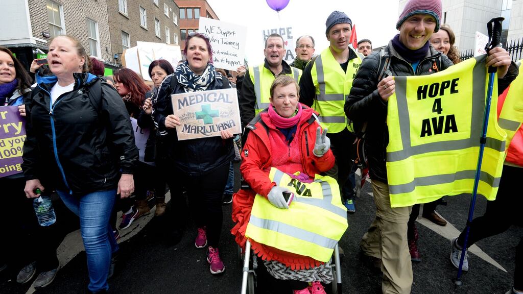 Vera Twomey with Gino Kenny making her way to Leinster House after her marathon walk in support of her daughter Ava Barry. Photograph: Cyril Byrne