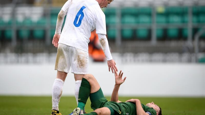 Ireland’s Conor Masterson is consoled by Iceland’s Alex Thor Hauksson. Photograph: Tommy Grealy/Inpho