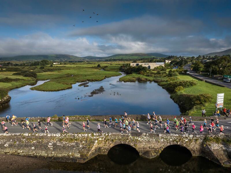 Taking on a half-marathon about four to six weeks before the full distance is universally regarded as good advice.