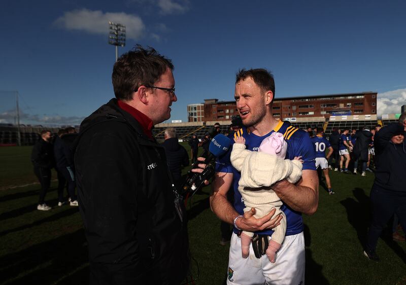 Damian O’Mara interviews Dean Healy of Wicklow with his daughter Aifric after the county's shock win at Laois Hire O'Moore Park. Photograph: Bryan Keane/Inpho
