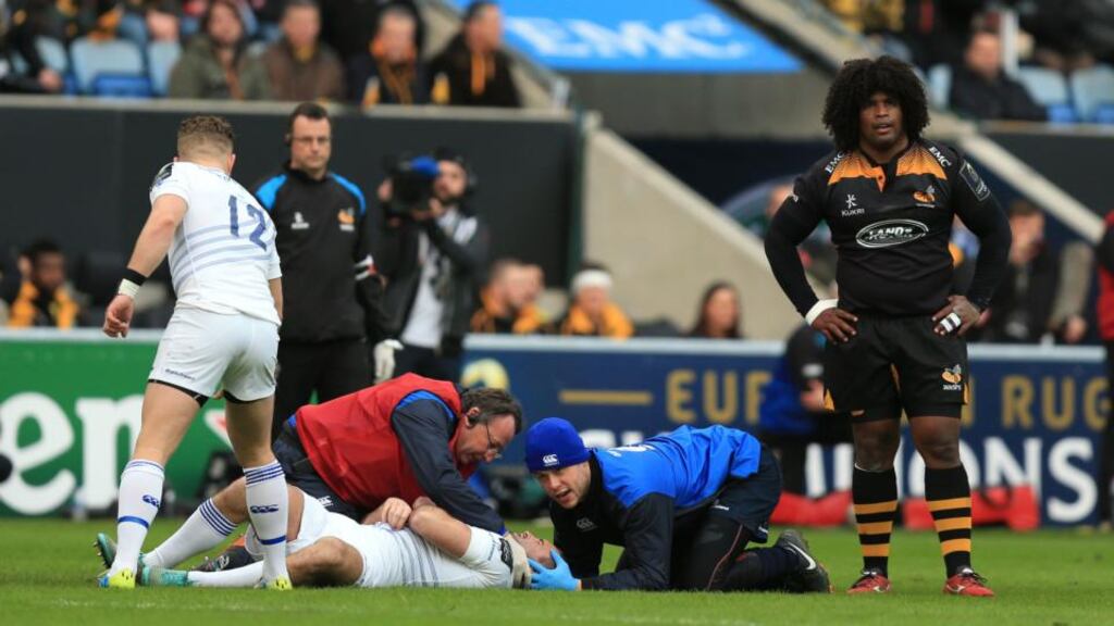 Wasps’ Ashley Johnson stands over Leinster’s Dave Kearney before being sin binned in the first minute of the Champions Cup match at the Ricoh Arena, Coventry. Photo: Mike Egerton/PA
