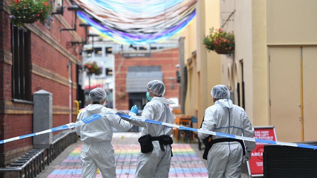 Police forensics officers at work in Hurst Street, Birmingham, after a number of people were stabbed in the city centre. Photograph: Jacob King/PA Wirework