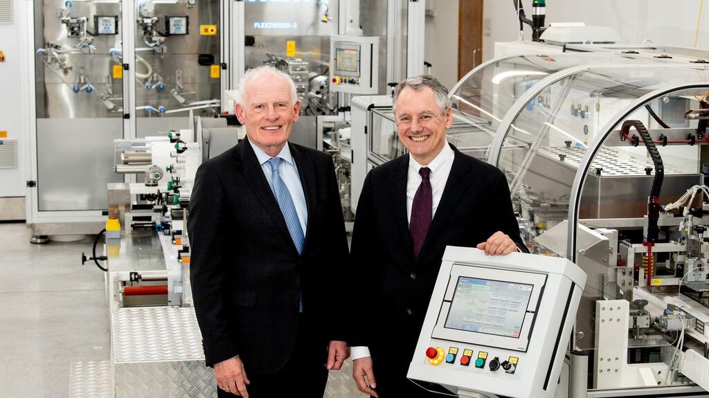 Gabriel Bradley, managing director of Naturelle, with Kevin Holland, chief executive of Invest Northern Ireland