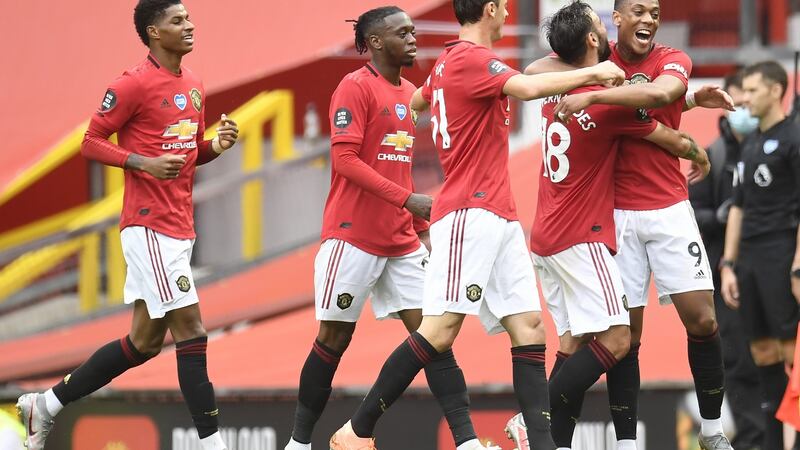 Manchester United celebrate after Anthony Martial scored his side’s third against Bournemouth. Photograph: Peter Powell/EPA