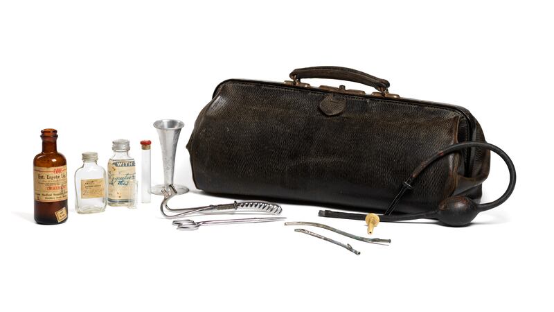 Midwifery bag dating from 1898, leather with metal handle and clasp. Photograph: Mary Ann Fanning Collection