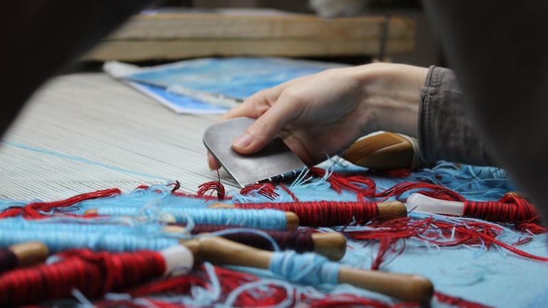 Working on the tapestry “Bilbo Comes to the Huts of the Raft Elves”.