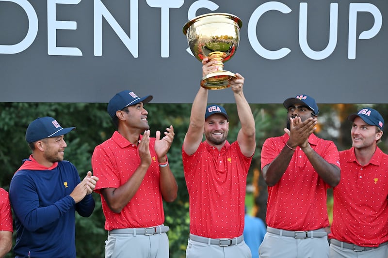 Wyndham Clark of the US team celebrates with the winner's trophy. Photograph: Minas Panagiotakis/Getty