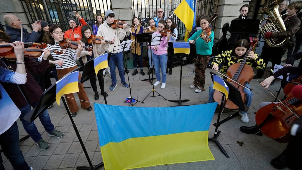 Members of the Royal Irish Academy of Music perform the Ukrainian national anthem outside Leinster House, Dublin, on Tuesday. The Dáil was debating a motion on Ukraine. Photograph: Niall Carson/PA Wire
