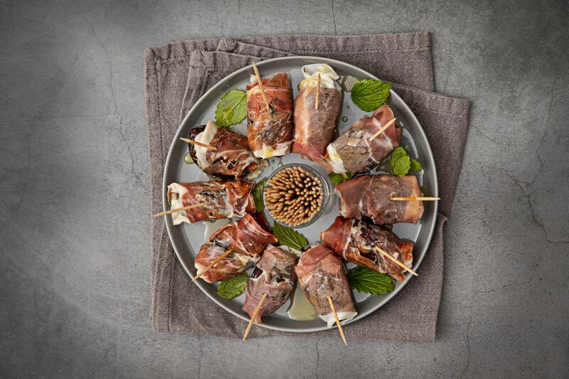 Medjool dates, Gorgonzola and prosciutto poppers. Photograph: Harry Weir Photography