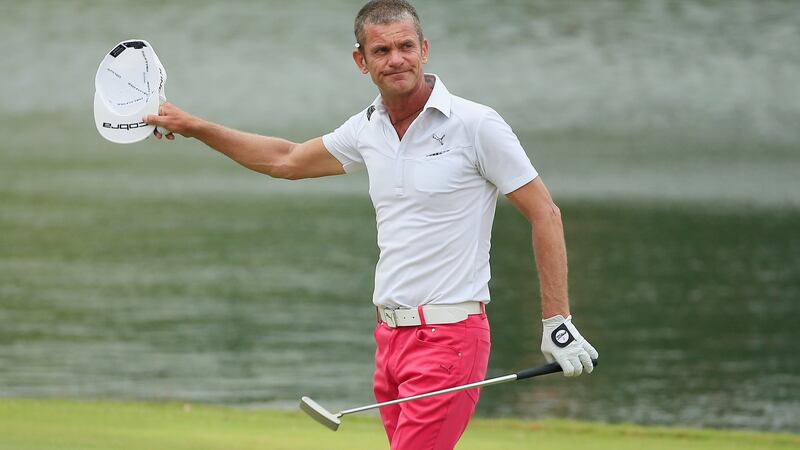 Jesper Parnevik of Sweden celebrates on the 18th green after his four-stroke victory at the Insperity Invitational at The Woodlands Country Club in  Texas. Photograph: Scott Halleran/Getty Images
